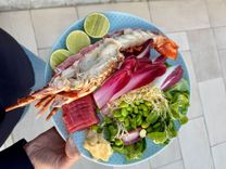 Anti-inflammatory foods: a dish with tuna, lobster, radicchio, edamame, and ginger rich in omega-3s